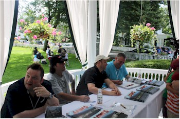 Matt Taylor and Jim Beller at the table signing